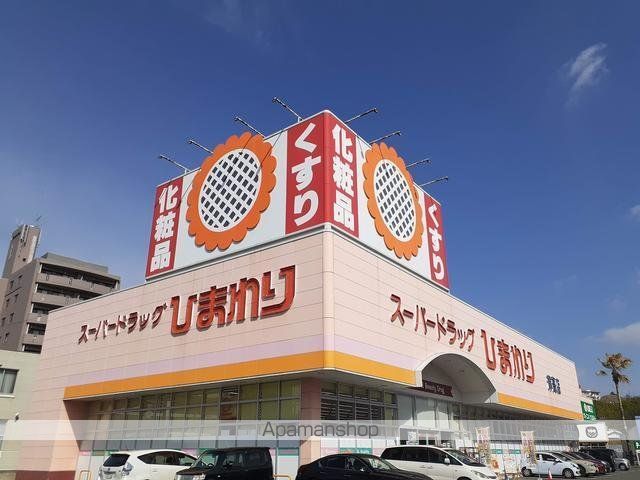 ドラックストア　くすりのラブ薬局津高店（ドラッグストア）まで450m