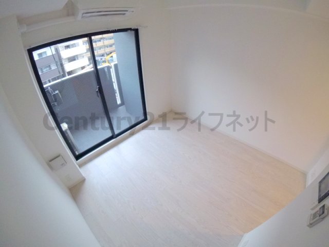 エムレジデンス新大阪ガーデンの居間写真