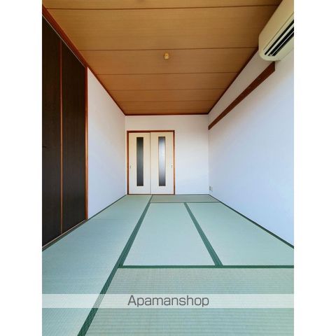 アメニティハイツ忍ケ丘の居間写真