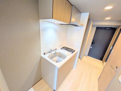 キッチン　写真は同タイプ６０３号室のもの