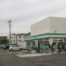 コンビニ　ファミリーマート 豊里七丁目店（コンビニ）まで215m
