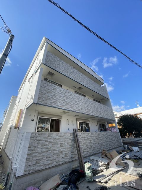 【交野市私市山手のアパートの建物外観】