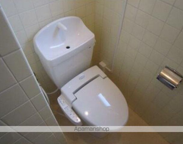 富山市 4階建 築41年のトイレ写真
