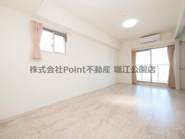 地下鉄長堀鶴見緑地線 玉造駅 徒歩2分 8階建 築7年の居間写真