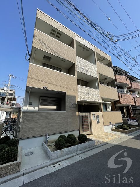 堺市北区奥本町のアパートの建物外観