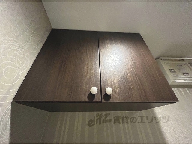 収納　洗濯機上