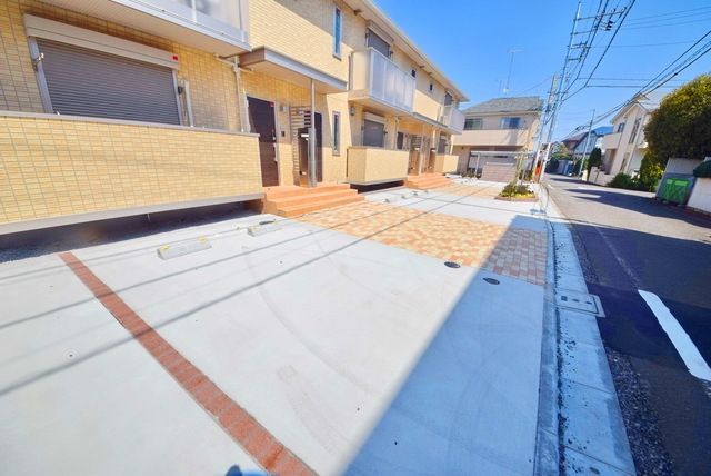 駐車場　タウンハウジング府中店まで