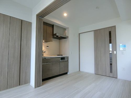ライオンズミレス新中野の居間写真