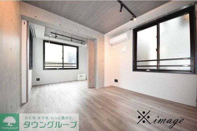 エクサム高円寺の居間写真