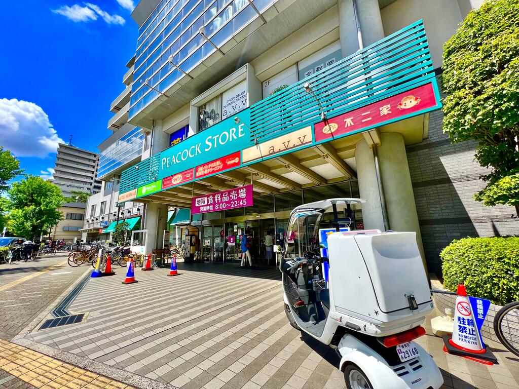 ショッピングセンター　ピーコックストア（ショッピングセンター）まで560m