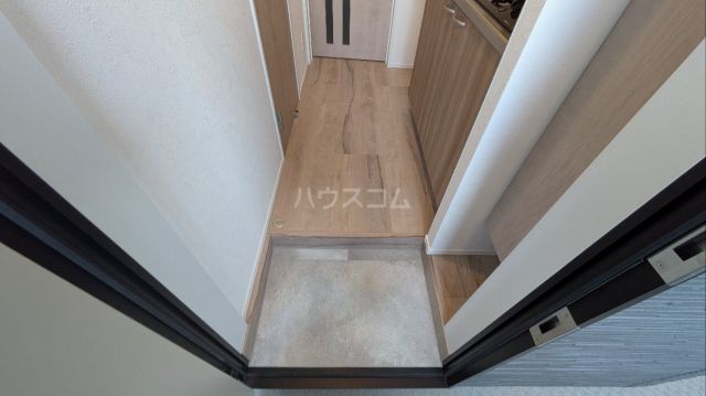 飯山満町3丁目APの玄関写真