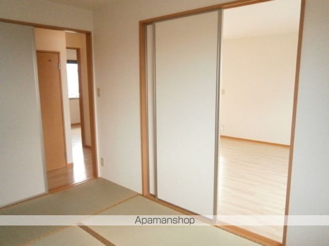 メゾンパークスIIの居間写真