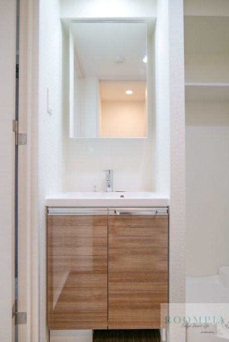 洗面設備　※同タイプの別のお部屋です。
