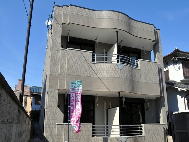 堺市西区浜寺石津町西のマンションの建物外観