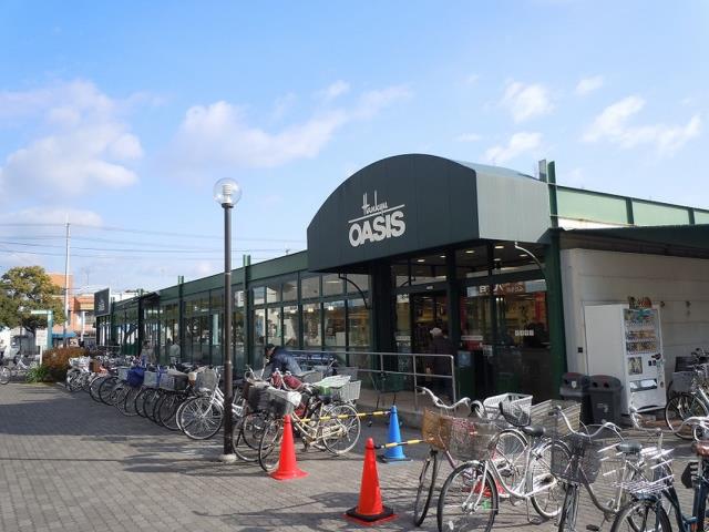 スーパー　阪急オアシス富田店（スーパー）まで1015m