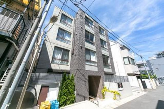 建物外観　管理員の勤務形態：巡回　　最上階