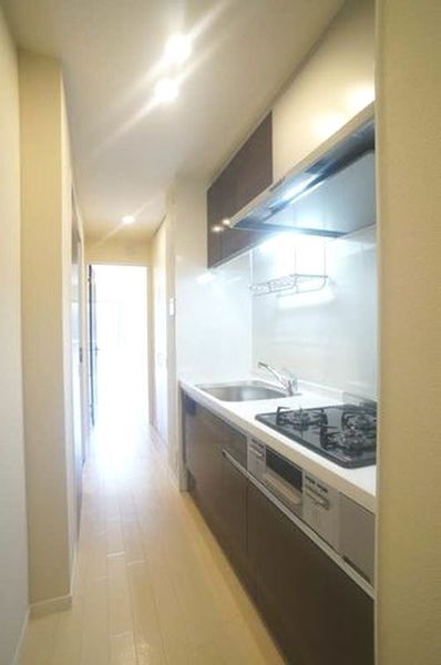 キッチン　※写真は入居前のものです。