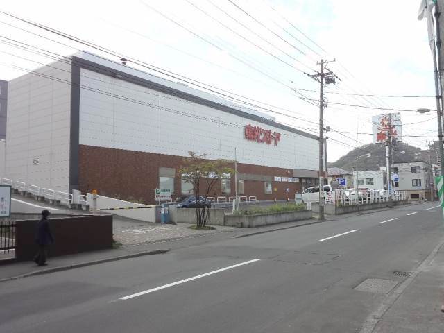スーパー　東光ストア西線6条店（スーパー）まで824m