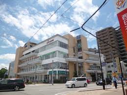 スーパー　サニー白木原店（スーパー）まで712m