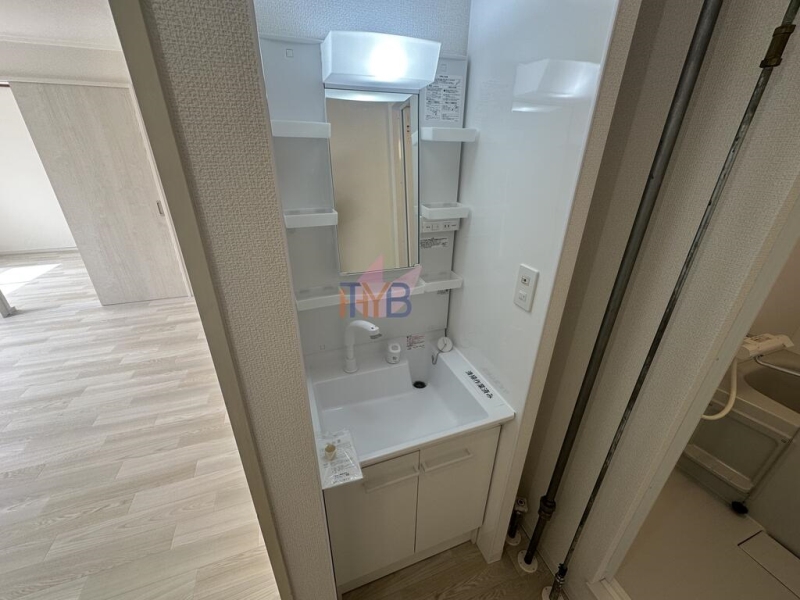 洗面設備　リフォームした別部屋の写真です。