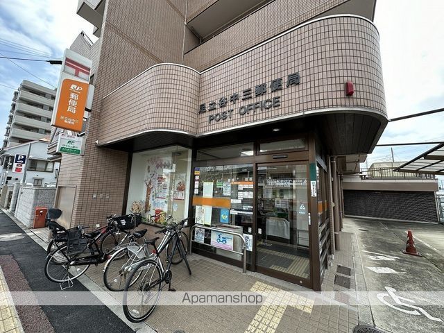 郵便局　足立谷中三郵便局（郵便局）まで873m