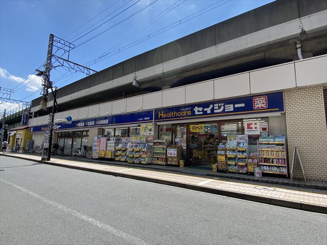 ドラックストア　ドラッグストア いわい亀有店（ドラッグストア）まで276m