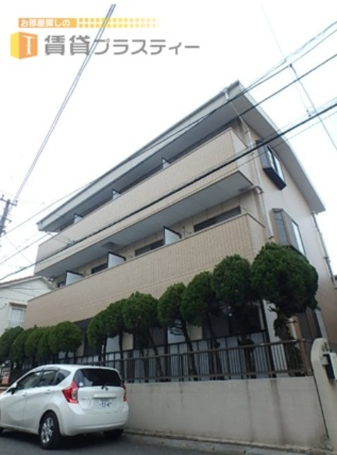 建物外観　ブラウンタイルの温かみのある外観です。