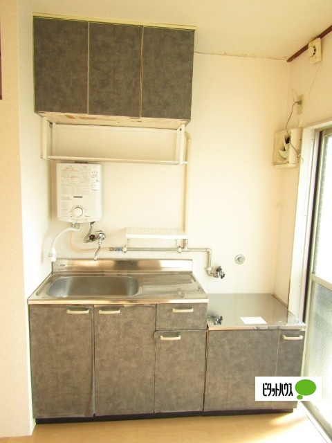 諏訪山マンションのキッチン写真