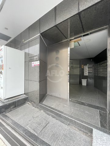 エントランス　サニーコート塩草　エントランス