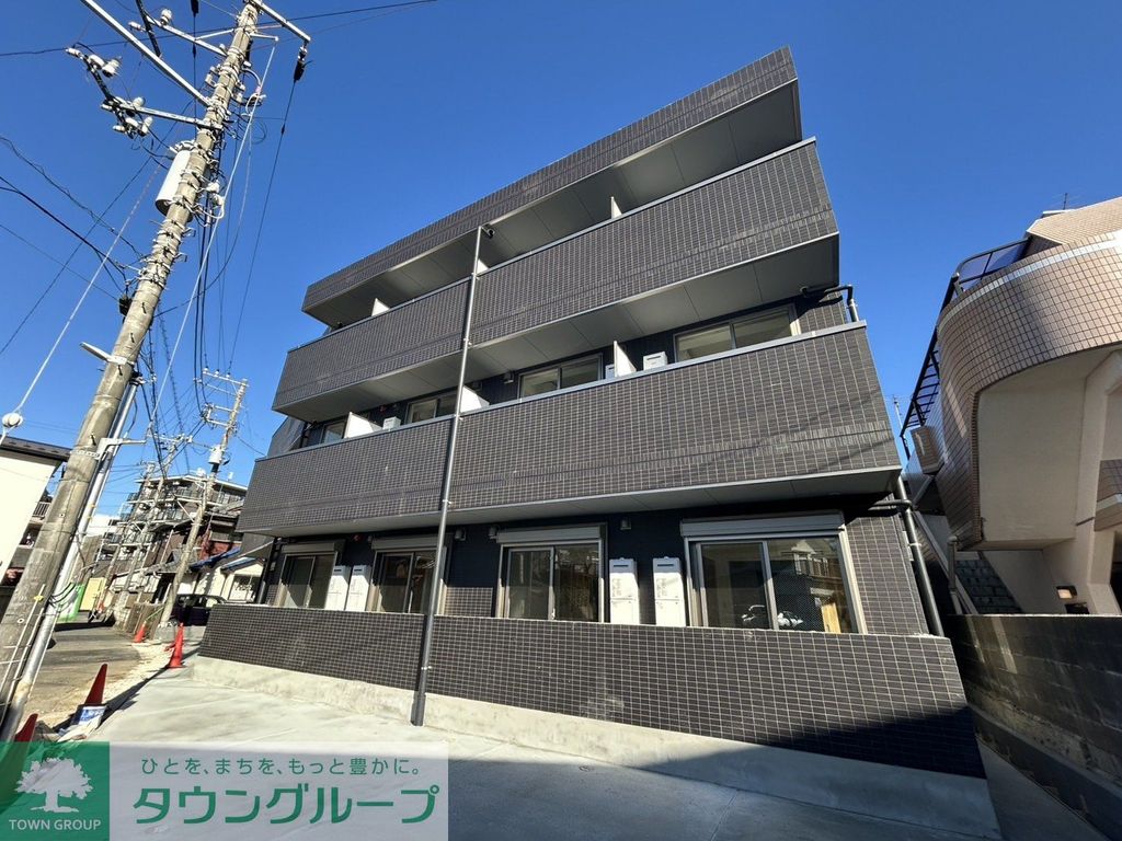 【千葉市稲毛区稲毛のマンションの建物外観】