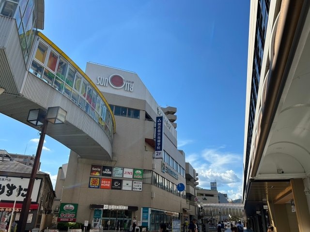 ショッピングセンター　サンシティ池田（ショッピングセンター）まで750m