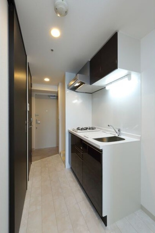 キッチン　※写真は同じマンションの違う部屋のものになります。