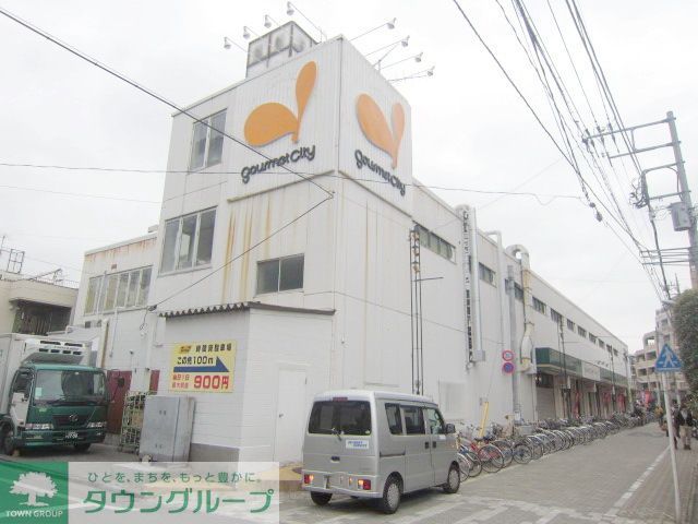 コンビニ　グルメシティ国立店（コンビニ）まで500m