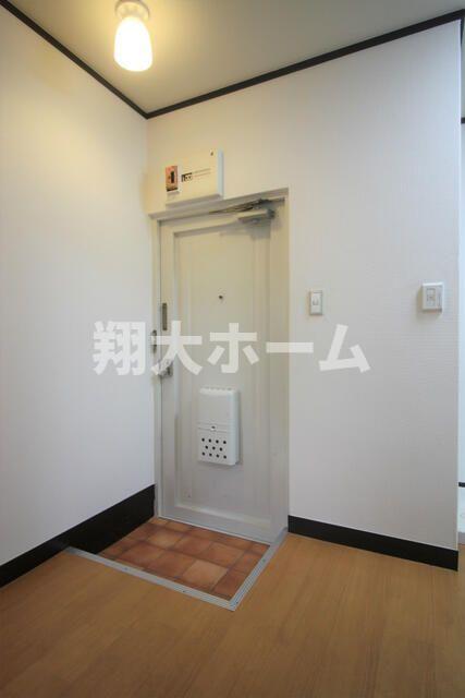 角野ビルの玄関写真