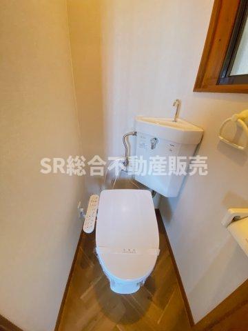 上四条町戸建てのトイレ写真