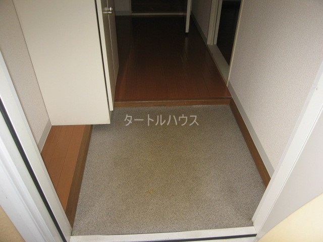 四條畷植村ハイツの玄関写真