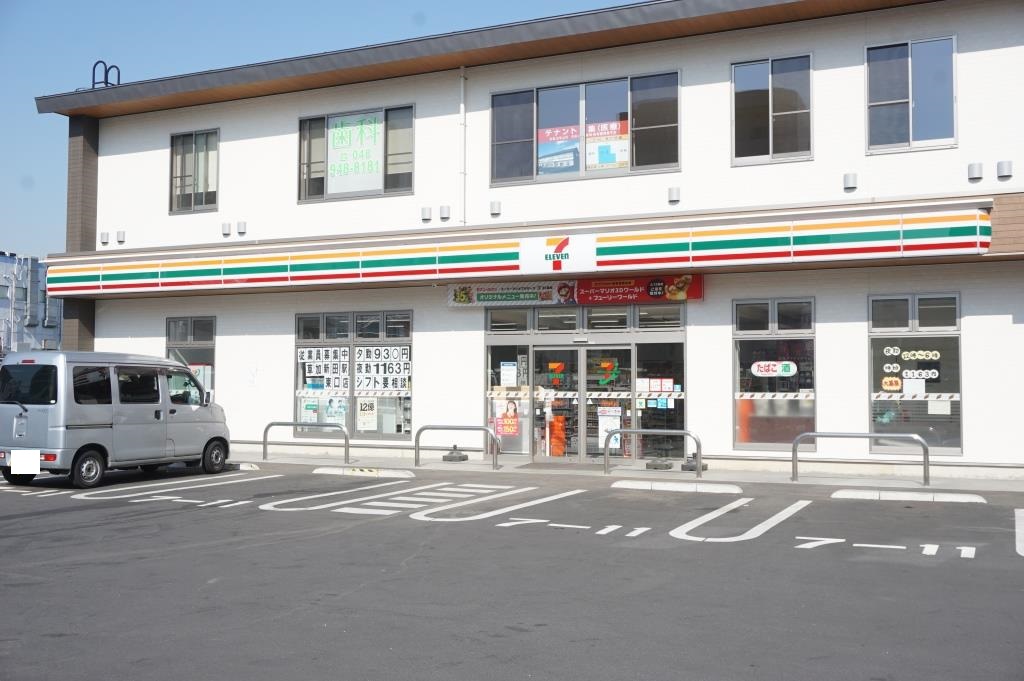 コンビニ　セブンイレブン 草加新田駅東口店（コンビニ）まで392m