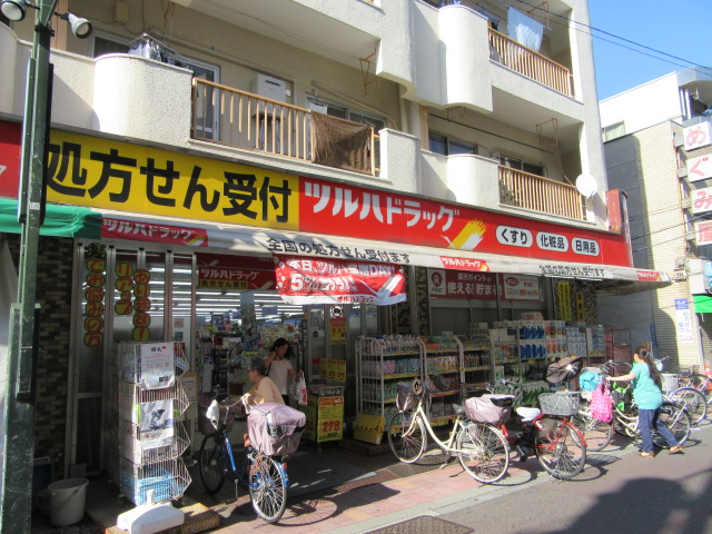 ドラックストア　ツルハドラッグ梅屋敷店（ドラッグストア）まで495m