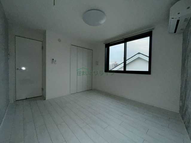 レピュア北池袋駅前レジデンスの居間写真