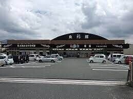 スーパー　食彩館KAWASHOKU糒店（スーパー）まで1087m