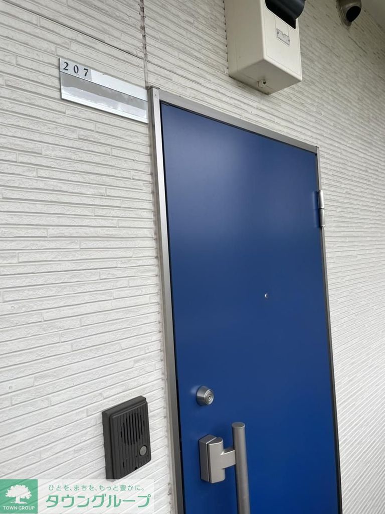 トレセリア椚田の玄関写真