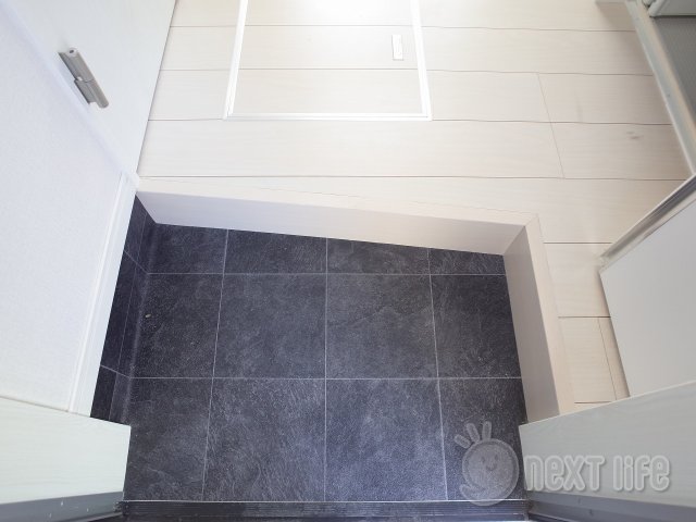 玄関　プライムテラス小田急相模原1A棟