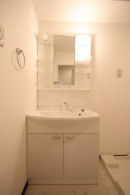 洗面設備　同物件別号室のものです。