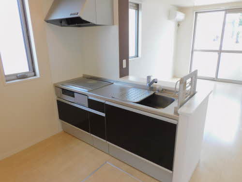 出水市 2階建 築13年のキッチン写真