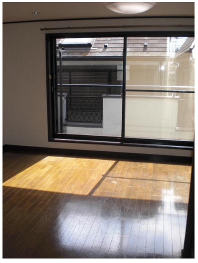 大田区上池台3丁目戸建ての居間写真
