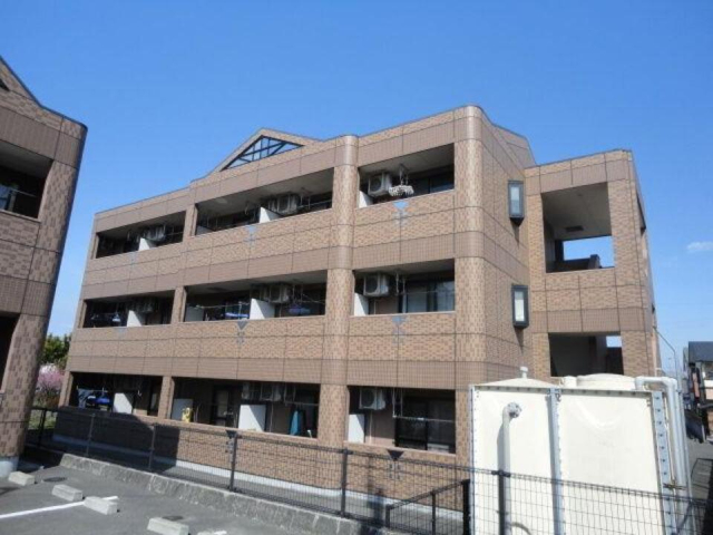 【伊予市下吾川のマンションの建物外観】