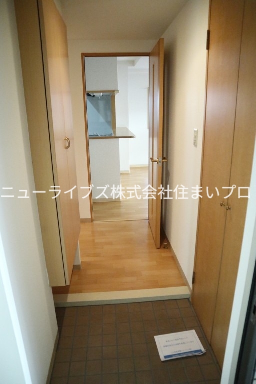 京阪本線 香里園駅 徒歩15分 3階建 築22年の玄関写真