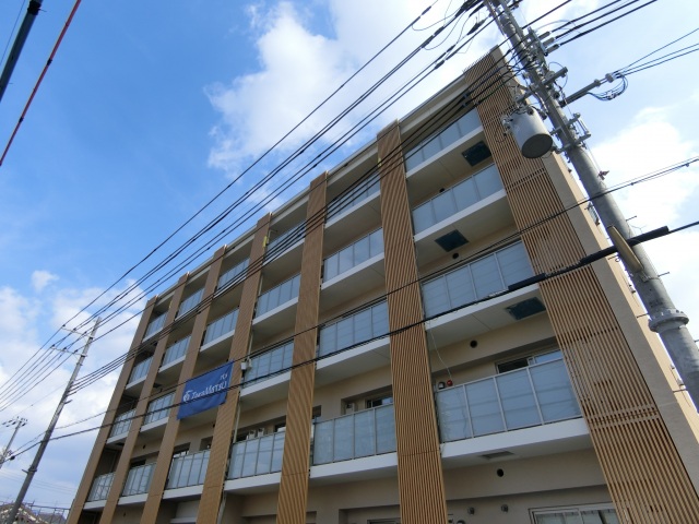茨木市蔵垣内のマンションの建物外観
