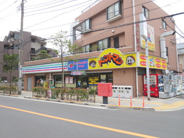 コンビニ　コミュニティ・ストア西新井7丁目店（コンビニ）まで876m