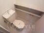 トイレ　ちょっとした棚板が嬉しいトイレスペース